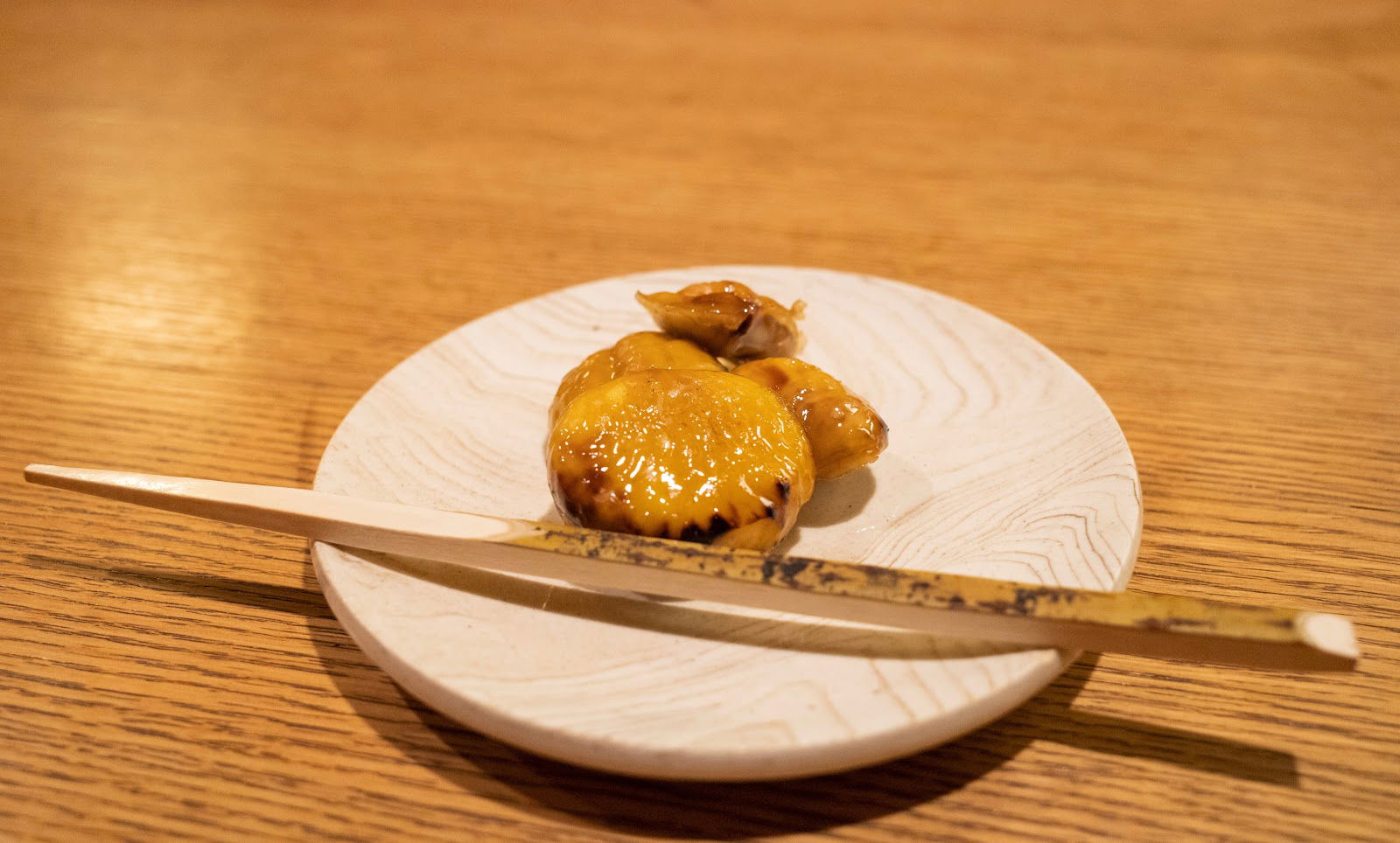 Gourmet dish on a wooden table at a fine dining restaurant
