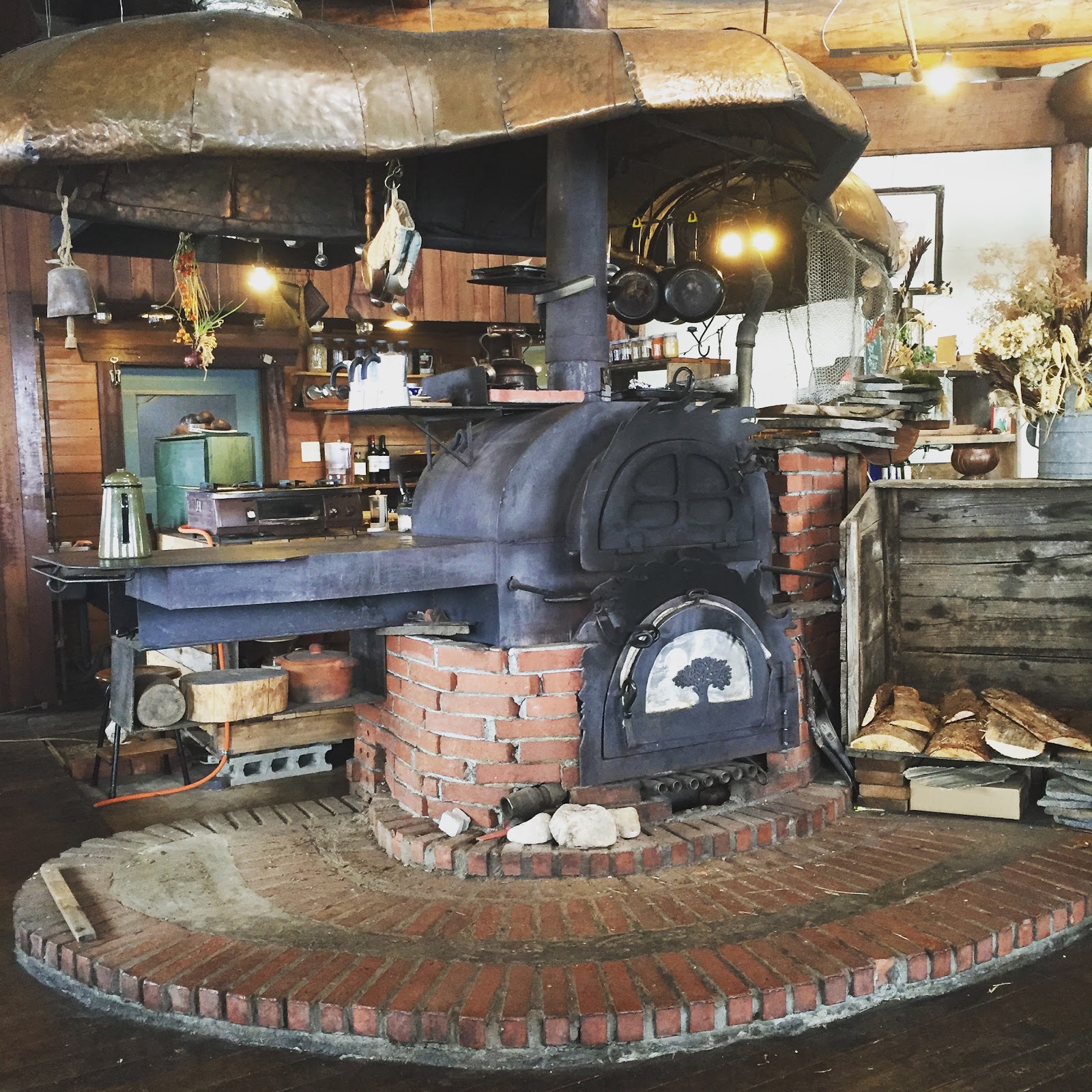 Rustic wood-fired oven at a cozy restaurant
