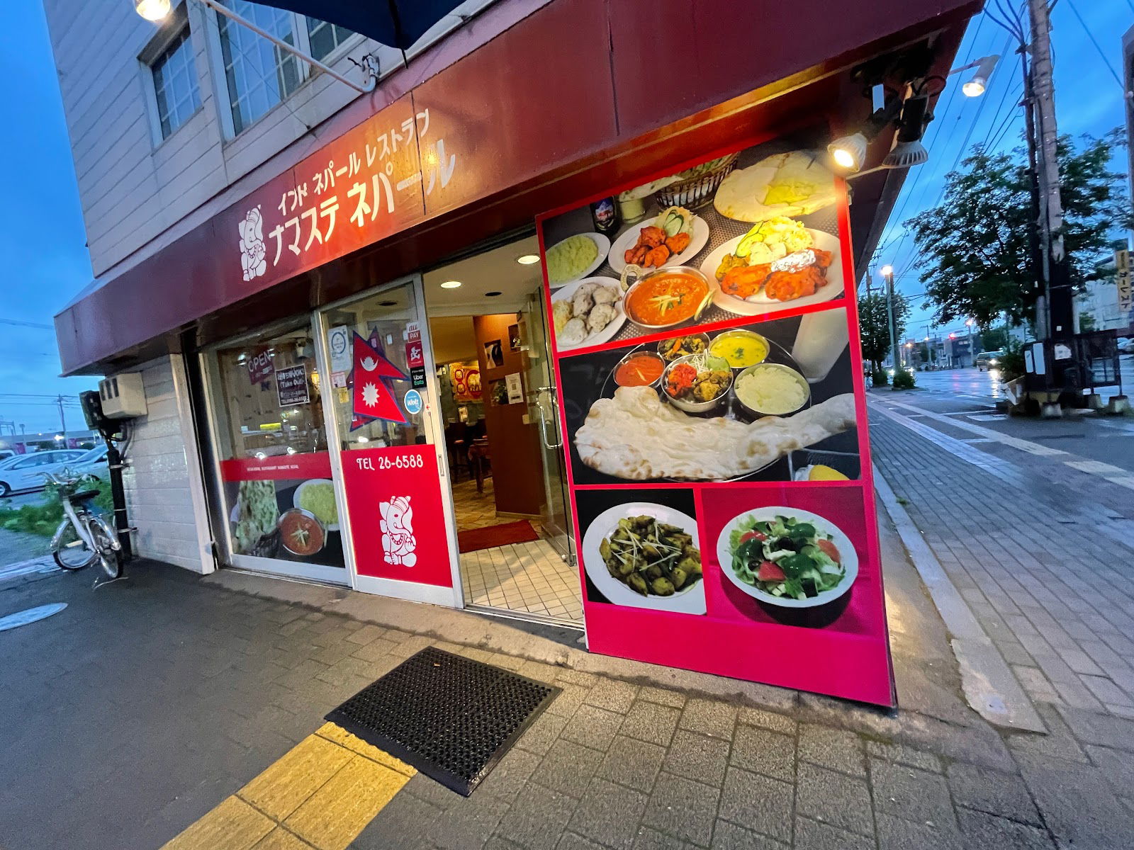Vibrant restaurant entrance with colorful menu display.