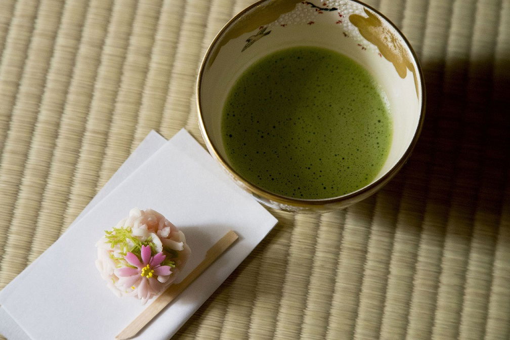 A cup of fresh matcha and a wagashi sweet, served at this Japanese tea ceremony in Asakusa.