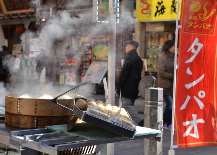 Steam rises from nikuman, steamed meat buns, in Yokohama Chinatown