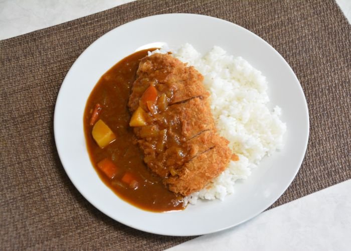 Japanese style curry topped with roast tonkatsu and white rice