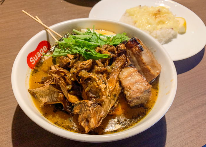 soup curry and a plate of rice