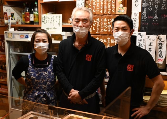 Owners of an Oden specialty shop posed for a photograph