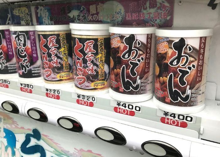 Cans of oden in a vending machine