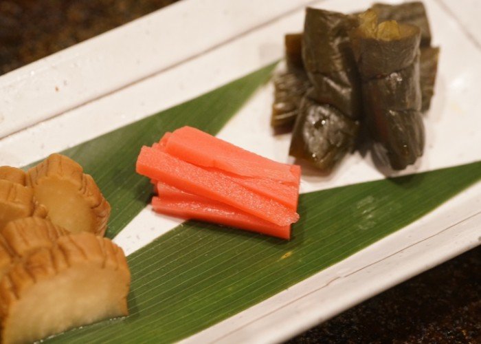 three tsukemono pickled vegetables on a plate