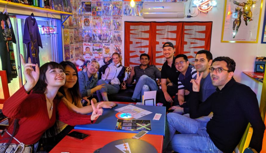 A group of people enjoying a bar-hopping tour in Shibuya.