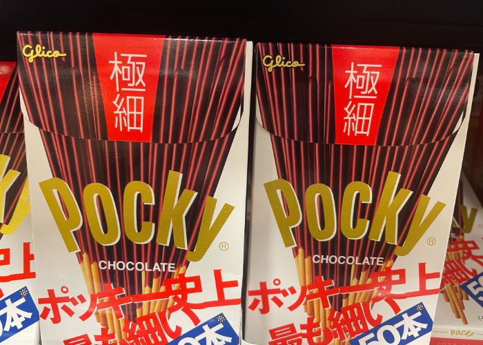 Multiple boxes of Gokuboso Pocky boxes on a shelf