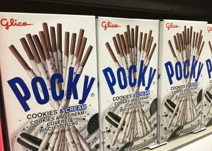 Multiple boxes of Cookies and Cream Pocky on display