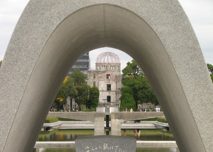 Cenotaph at Hiroshima Peace Park looking onto the Atomic Bomb Dome
