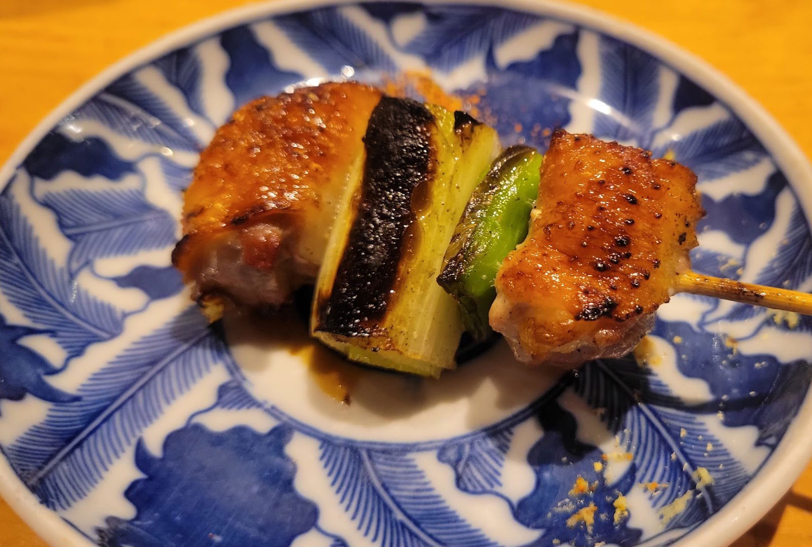 The delicious charred chicken and veggies of Yakitori Ogawa.