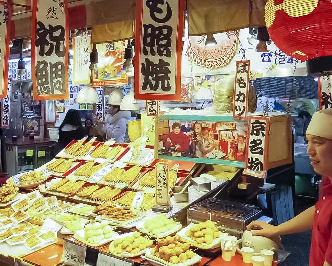 The local food stalls of Nishiki Market, filled with Kyoto specialties.