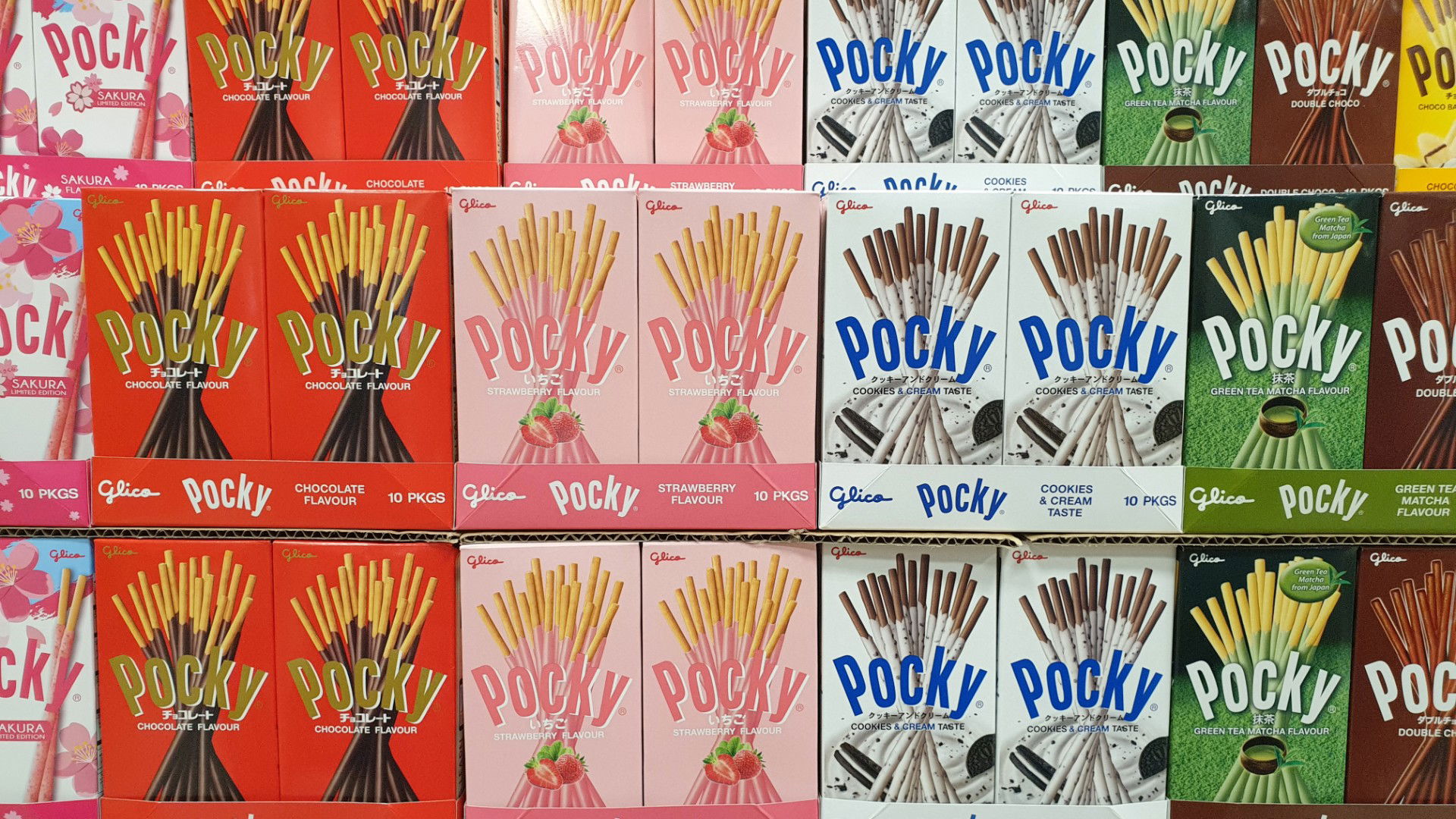 Colorful Pocky boxes arranged neatly in a vibrant grid display
