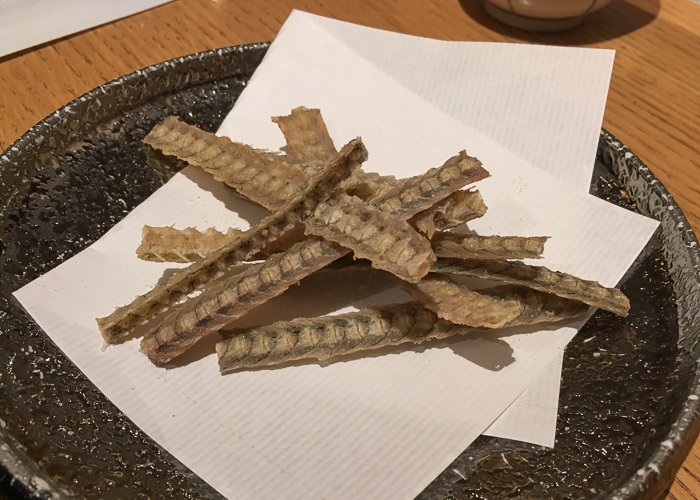 eel bone crackers on a dish