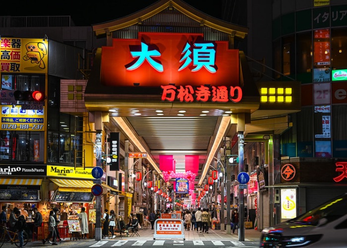 Osu shopping district illuminated by night.