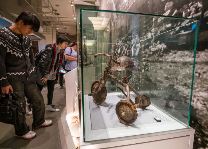 Interior of the Hiroshima Peace Memorial Museum behind the Peace Flame. The museum is located in Hiroshima Peace Memorial Park, and was established in 1955.