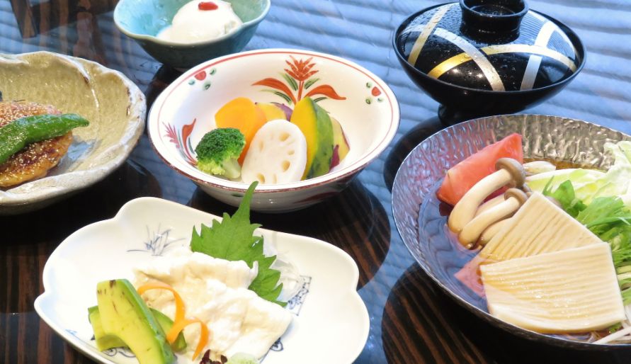 Elegant Japanese course menu with assorted traditional dishes