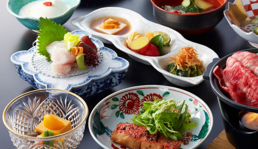 Exquisite Japanese course menu with sashimi and grilled delicacies
