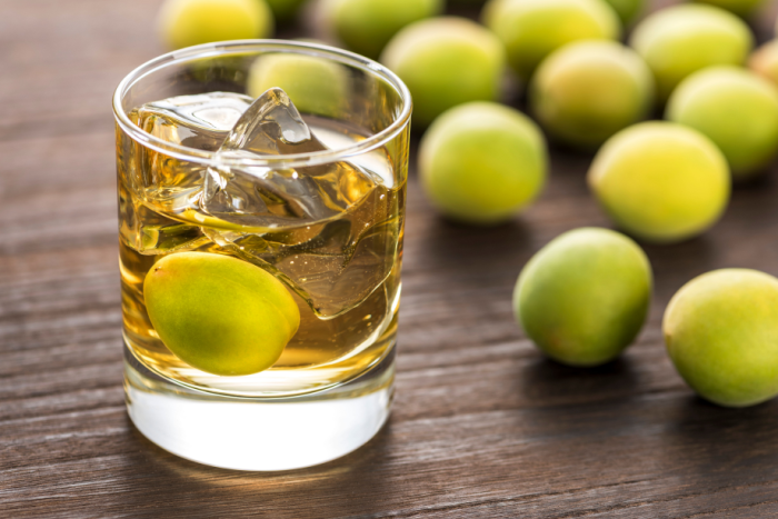 a glass of umeshu, served on the rocks