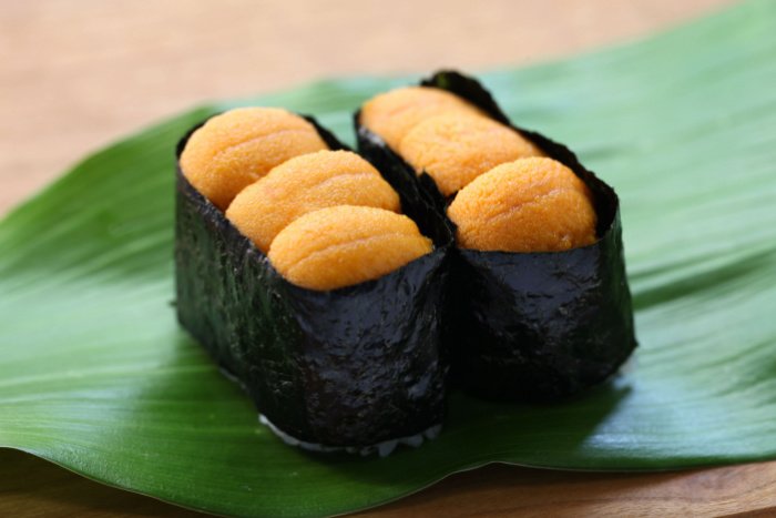 Sea Urchin Sushi Rolls on a green leaf