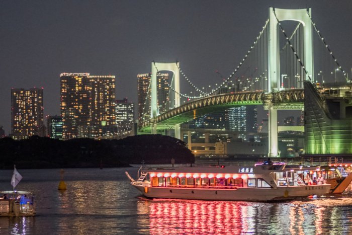Yakatabune boat near Rainbow Bridge in Tokyo, on a summer night