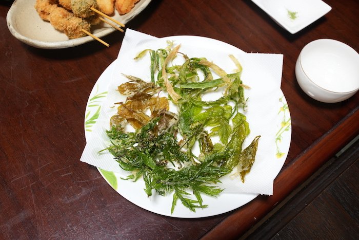 A plate of tea leaf tempura in Japan