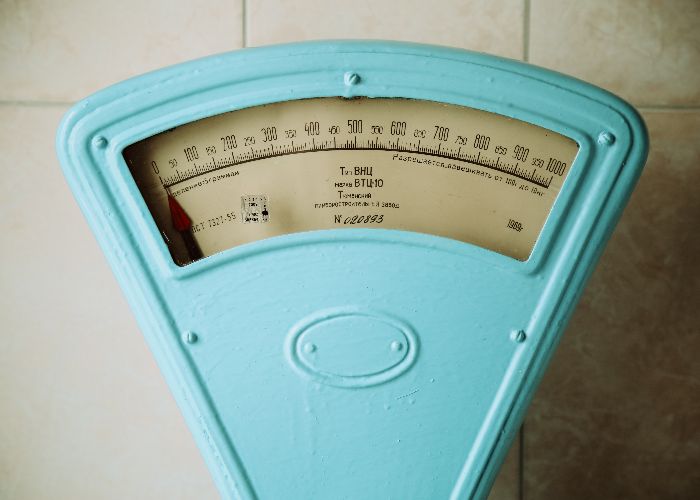 A blue weight scale