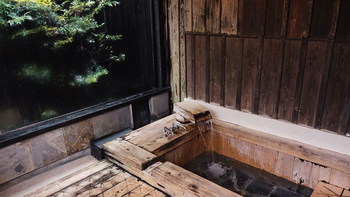 Private wooden hot spring in the forest