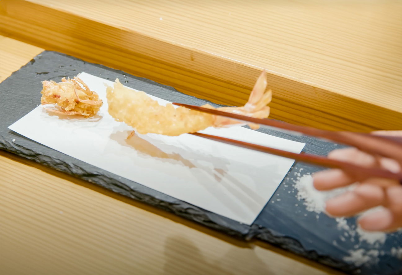 A perfected ebi tempura being served at Tempura Ono.