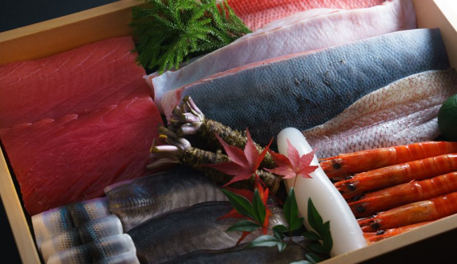Fresh sushi-grade fish and seafood selection on display