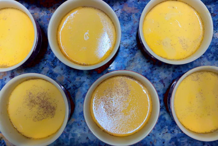 A tray of homemade Japanese purin in ramekins