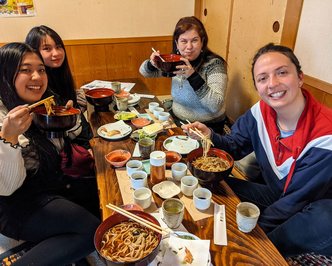 Four guests enjoying a handmade soba lunch on this Matsumoto food tour.