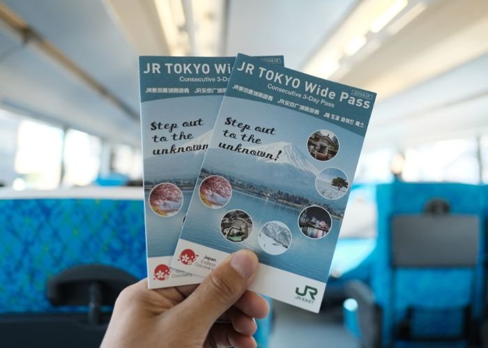 A pair of JR Tokyo Wide Pass booklets.