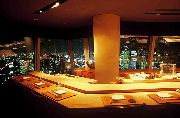 Elegant city-view restaurant with modern dining setup