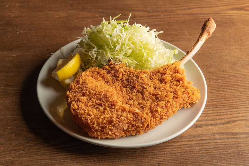 A gigantic Tomahawk-style tonkatsu at Tonkatsu Fujiki Ningyocho.