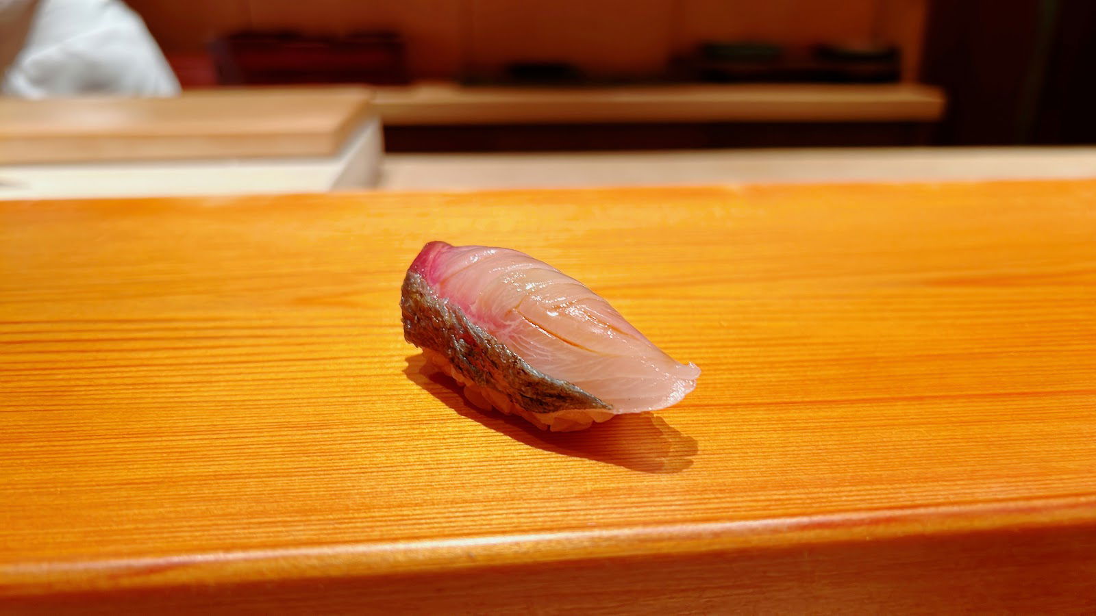 Fresh fish laid over rice at the counter of Nishiazabu Sushi Shin.