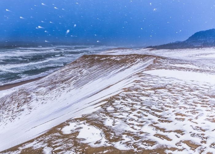A view of the Tottori Sand Dunes covered in snow during the winter