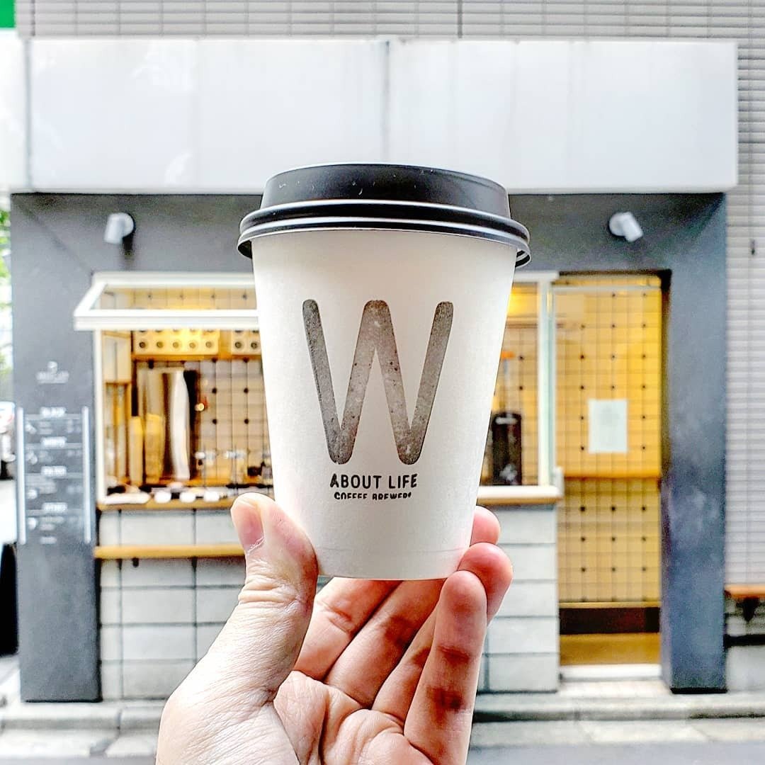 A to-go coffee cup from About Life Coffee Brewers in Shibuya