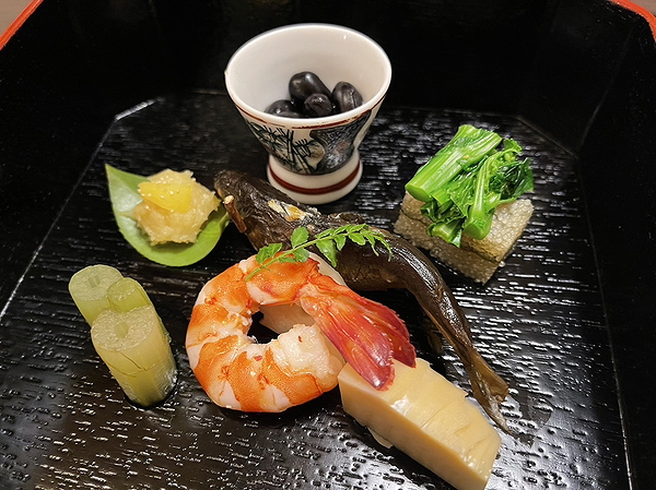 Elegant Japanese cuisine platter with shrimp and fish delicacies