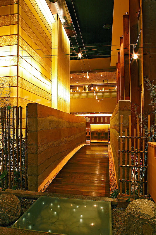 Elegant restaurant interior with wooden accents and warm lighting