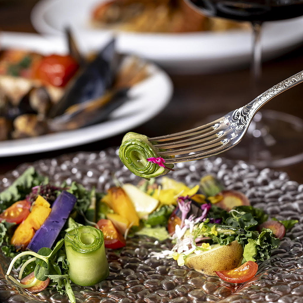 Gourmet salad with fresh vegetables at a fine dining restaurant