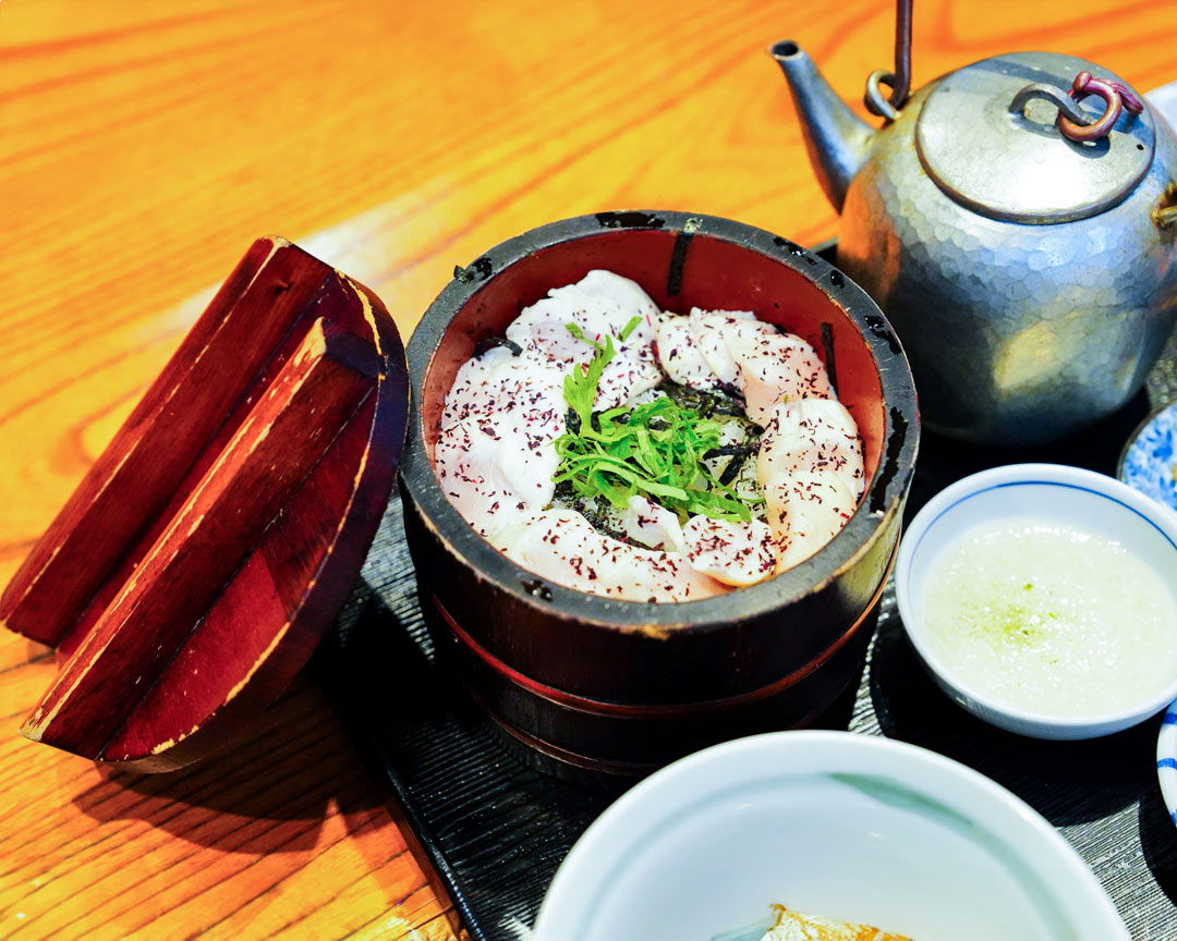 The traditional Japanese breakfast dishes of this Japanese breakfast and Shinjuku Park morning tour.