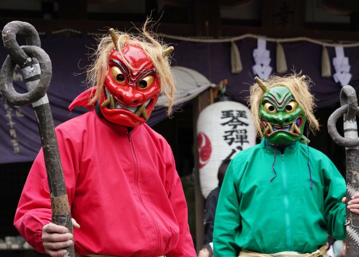 Two Japanese men dressed as oni (ghosts) for Setsubun