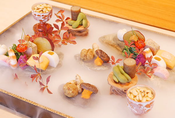 Elegant autumn-themed dessert platter at a gourmet restaurant