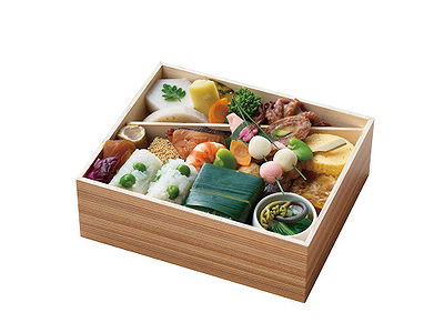 Elegant restaurant bento box with assorted Japanese cuisine