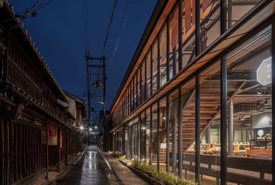 The modern, glassy frontage of Sukiyaki Kappo Kitsune.