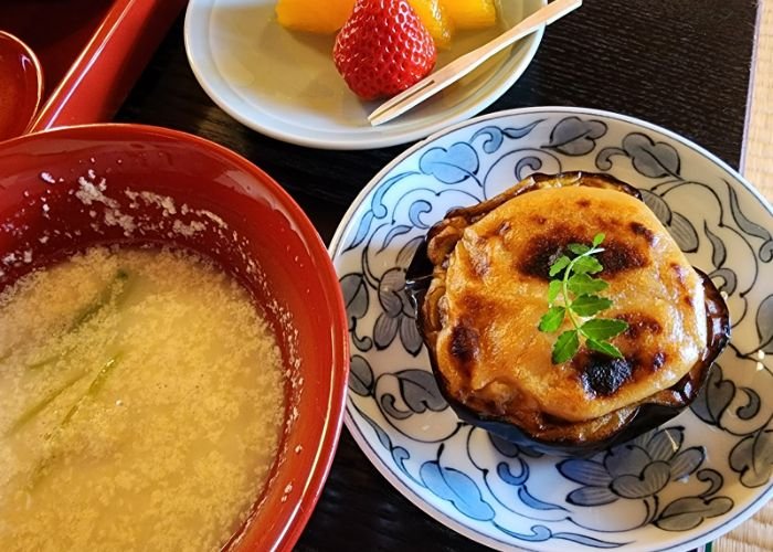 A selection of dishes at Tenryuji Temple Shigetsu in Kyoto, featuring seasonal ingredients and flavors.