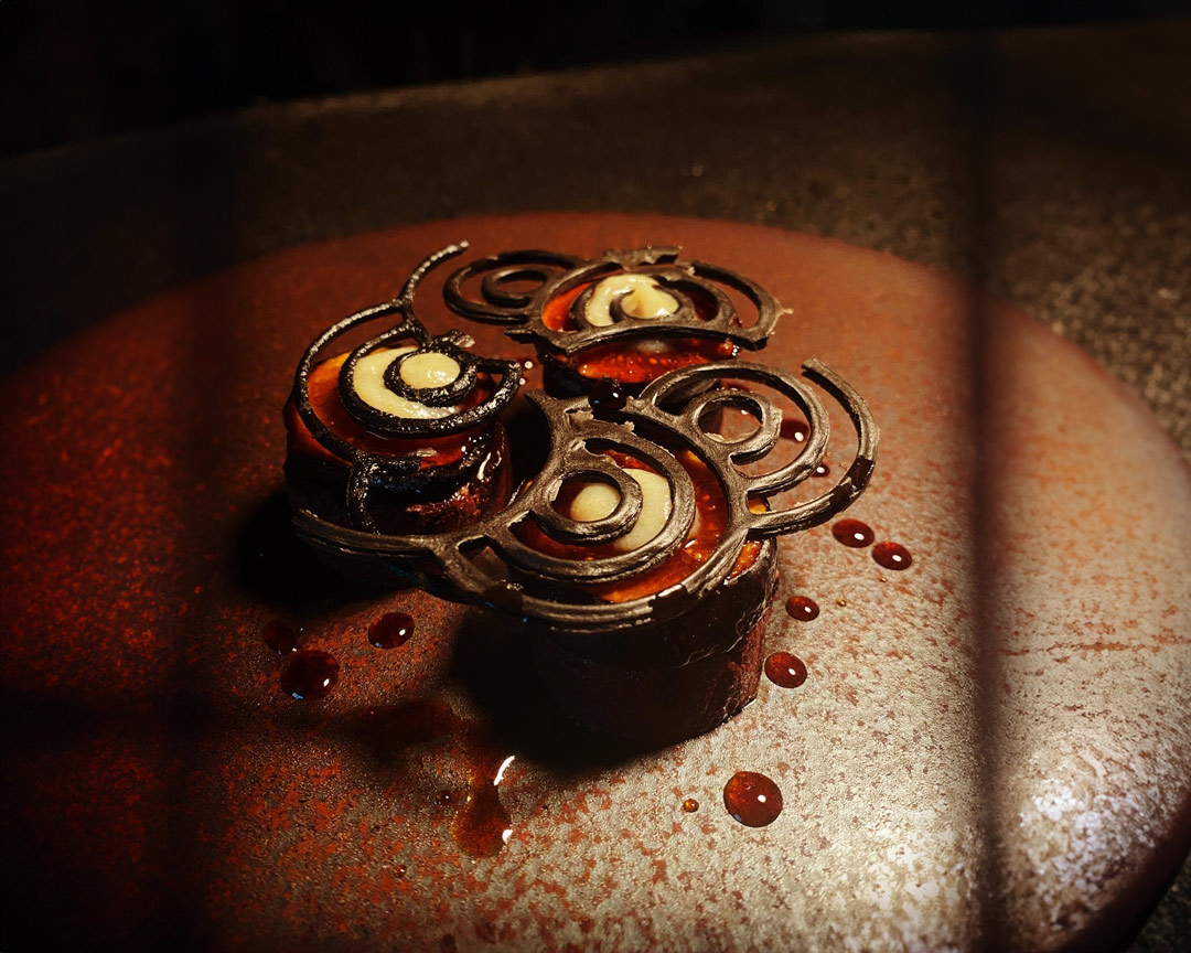 A picturesque dish at Alternative, featuring a spiral decoration.