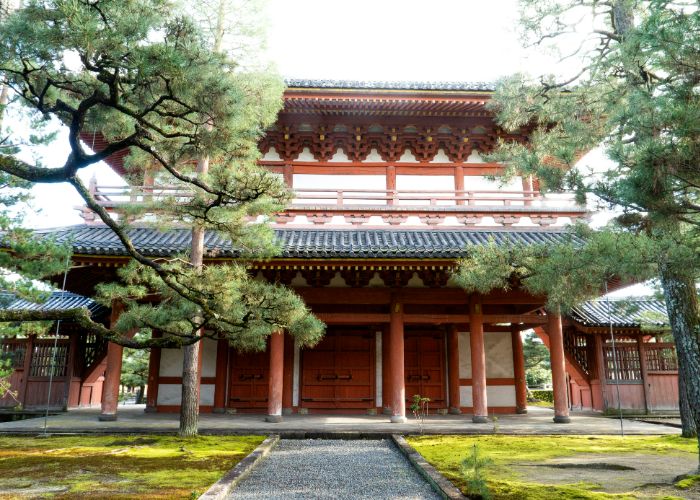 The Buddhist temple of Daitokuji, standing tall behind trees.