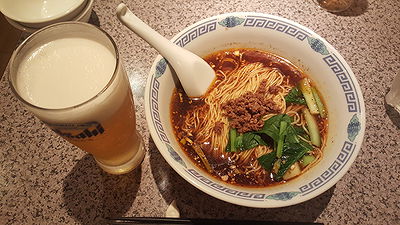Delicious ramen with beer at a restaurant